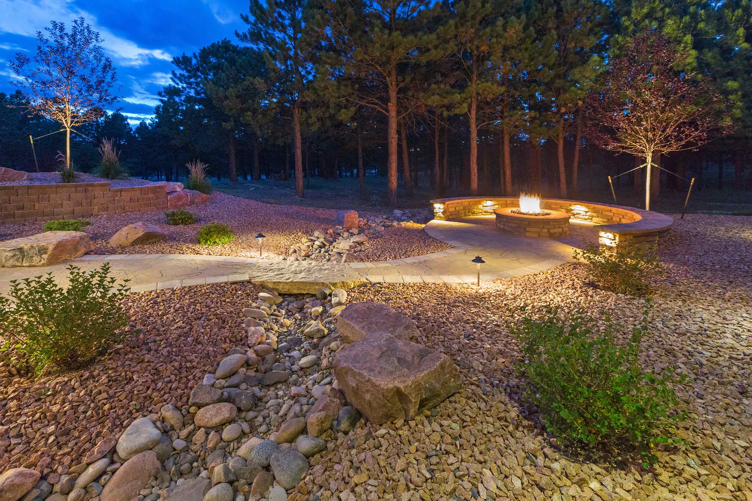 Landscaping and Hardscaping - Firepit with bench seating.